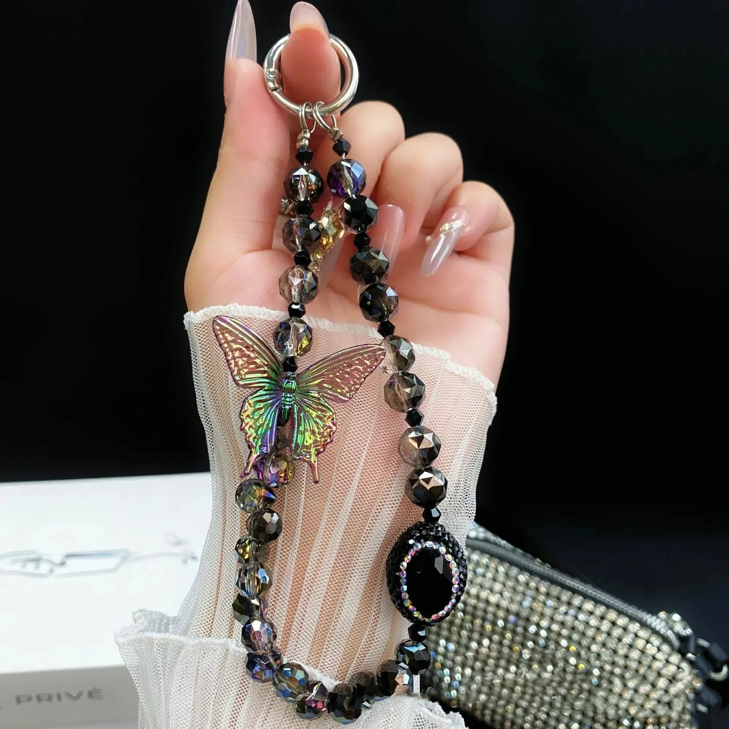 Oppo A5 Pro 5G Shockproof Shimmer Butterfly Stand Case with Charm Strap